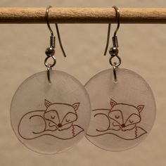 Brown napping fox print on 1 inch circular clear glossy shrink plastic discs. Surgical stainless steel earwires. Gold Fox, Fox Earrings, Fox Jewelry, Fox Print, Shrink Plastic, Animal Earrings, Eyeglass Chain, Teacher Christmas Gifts, Earring Sale