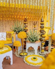 a yellow and white wedding decorated with flowers