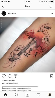 a tattoo with musical notes on it