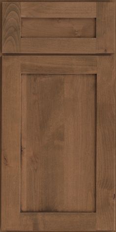 a close up view of a wooden cabinet door