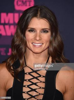 a woman in black dress at the cmt music awards arrivals event on november 20, 2016