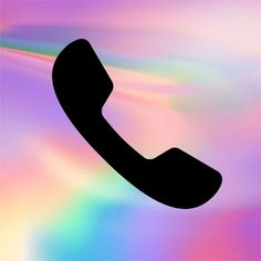 a black phone sitting on top of a rainbow colored background with the letter t in it's center