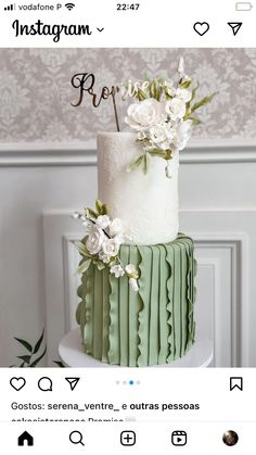 a green and white wedding cake with flowers on the top is featured in instagram