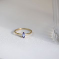 Tanzanite Solitaire Ring, Marquise Tanzanite Ring, 14K Solid Gold Ring, Tanzanite Stone Solitaire Ring, Minimalist Ring, Gifts for Her ≫ Product Details ◈ Handmade / Handcrafted Fine Jewelry ◈ Stone: 100% Natural Tanzanite ◈ Stone Size: 7mm x 3.6mm (0.35 ct) ◈ Band Thickness: 1.5mm ◈ Metal: Solid 14K Gold  ◈ Gold Color: White gold, Rose gold, Yellow gold ≫ Please read our FAQ below for more detail. Fun Clothes, Ring Marquise, Tanzanite Stone, Wedding Rings Solitaire, Solid Gold Ring, Rings Fashion, Tanzanite Ring, Accessories Ideas, Ring Minimalist