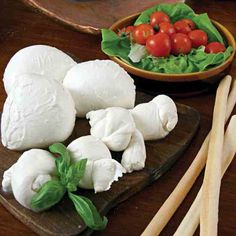 several different types of food on a wooden table