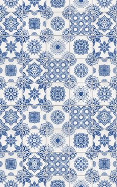 a blue and white wallpaper pattern with many different designs on the side, including an intricate