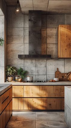 a kitchen with wooden cabinets and counter tops in the middle of an open floor plan