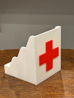 Introducing the ultimate First Aid Box by Bat Country Crafts - your go-to solution for keeping bandages and medical supplies organized and accessible! This isn't just any first aid kit; it's a versatile Bandaid Holder Organizer designed to revolutionize how you store and access your medical essentials.  Whether you need a car first aid kit, a home medical station, or an office health hub, this compact white medical caddy with its distinctive red cross has got you covered. Why choose our First Ai Car First Aid Kit, Medical Essentials, Medical Supply Organization, Office Health, Car Home, Country Crafts, Aid Kit, First Aid Kit, Band Aid