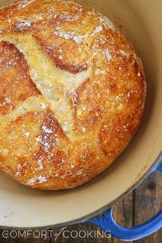 a loaf of bread sitting in a bowl