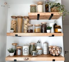 some shelves with jars and containers on them