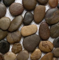 some rocks are laying on top of each other