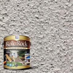 a can of paint sitting on top of a floor