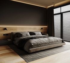 a large bed sitting in the middle of a bedroom next to a window with blinds