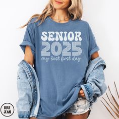 This SENIOR 2025 MY LAST FIRST DAY Comfort Colors® shirt is the perfect way to celebrate the last (first) day of school this school year.  The retro vibe of this design gives this 2025 grad shirt a vintage look that is trendy and sure to get lots of compliments on the 1st day of school.  Buy for yourself or make this a gift for your favorite graduating high school or college senior in the class of 2025! PLEASE READ THROUGH ALL OF THE FOLLOWING INFORMATION.  IF YOU HAVE FURTHER QUESTIONS, WE ARE HAPPY TO HELP! Welcome to CuratedClothCo.!  Here you can find the perfect, trendy attire whether you are gifting for someone else or yourself.  We strive to provide quality merchandise and quick customer service in order to make your buying process fun and easy.  We hope you love our designs as much Junior Shirts Class Of 2023, 23 Class Shirts, Senior Class Shirts, Grad Shirts, Class Shirt, Senior Shirts, Class Of 2025, School Tees, 1st Day Of School