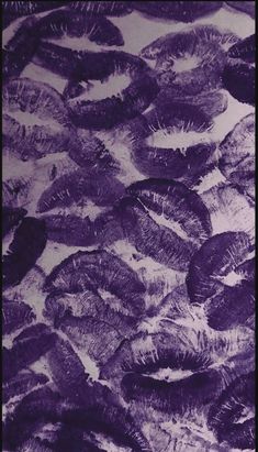 an image of purple feathers in the air