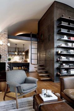 a living room filled with furniture and a fire place in the corner next to a brick wall