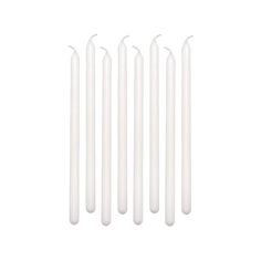 six white candles sitting next to each other