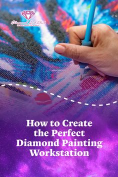 a hand holding a pencil over a painting with the words how to create the perfect diamond painting workstation