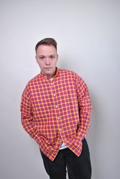 This 90s red plaid shirt is a classic piece that adds a touch of rustic charm to any outfit. The vintage check print, button-up patterned lumberjack shirt features long sleeves, perfect for cooler weather. Made from cotton, it offers a comfortable and breathable fit. The shirt is a size L, with sleeve measurements of 47cm (18.5 inches) from armpit to end of sleeve, a width of 58cm (22.83 inches), and a length of 77cm (30.31 inches), all taken seam to seam while lying flat. Please note that this Plaid Relaxed Fit Long Sleeve Flannel Shirt, Plaid Long Sleeve Flannel Shirt With Relaxed Fit, Plaid Long Sleeve Relaxed Fit Flannel Shirt, Casual Gingham Shirt For Fall, Red Button-up Flannel Shirt For Spring, Casual Gingham Flannel Long Sleeve Shirt, Casual Long Sleeve Gingham Flannel Shirt, Casual Gingham Long Sleeve Flannel Shirt, Red Flannel Shirt For Fall