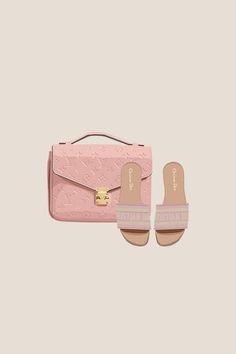 a pink handbag and pair of slippers