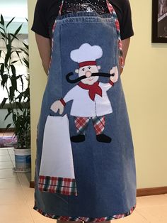 a person wearing an apron with a chef on it