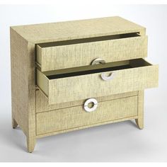 a wooden drawer with two drawers on one side and an open drawer on the other