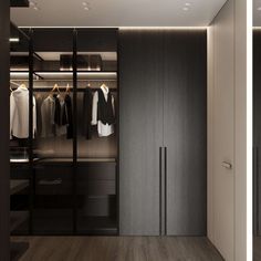 an open closet with clothes hanging in it