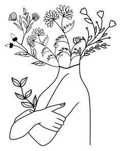 a hand holding a vase with flowers in it