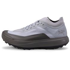 the men's shoe is white and grey with black accents on the upper part