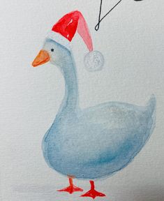 a watercolor painting of a duck wearing a santa hat and holding a christmas ornament