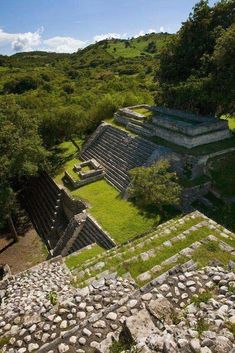 an aerial view of the ruins and surrounding trees