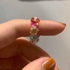 Beautiful handmade beaded rings! Each one is unique Please choose the size! 😘 If you have any questions, please DM me.  All the rings are different! Different color, Different shapes.  The beads used are all imported.  *Try to avoid prolonged exposure to water. *Accessories occasionally have defects.  If you want to choose the color of the flowers, please send me a message. Colorful Beaded Ring Gift Jewelry, Gift Colorful Beaded Round Rings, Multicolor Beaded Flower Ring As Gift, Adjustable Flower Ring With Colorful Beads, Adjustable Multicolor Beaded Flower Ring, Water Accessories, Rings Cute, Beaded Ring, Good Friends