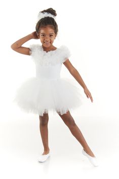 "White Tutu Dress is the perfect fit for a little ballerina. This dress is very fun and playful with its tulle neckline and extra fluffy tutu skirt while still being very comfortable. The top part is made out of soft, stretchy white fabric and feels comfortable enough to wear it on a regular day.  All of our products are handmade in Istanbul in our little atelier. The fabrics we use have certifications proving safety of the materials.  SIZING Please make sure to see the size chart.  The measurements of all sizes on this listing are precisely and accurately stated.  The model pictured above is 5 years old and is 117 cm tall. She is wearing the size \"Ages 5-6\".  She could also fit in the size \"Ages 3-4\" since the outfit is stretchy.  Please feel free to contact us regarding sizing concer White Ballet Dress, White Ballerina Dress, White Tutu Dress, Dress Birthday Party, Tulle Neckline, White Tutu, Girls Tutu Dresses, Ballerina Dress, Little Ballerina