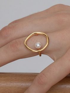 $12.99; Modern and minimalist design.  Material: Gold-plated brass & Natural pearl  #kamakulashop #minimalist #parisianchic #parisian #jewelrylovers #pearlrings #goldpearlrings #evileyering Mount Etna, Bijoux Fil Aluminium, Natural Pearl, Jewelry Inspo, Natural Pearls, Pearl Ring, Modern Jewelry, Minimalist Jewelry, Wire Jewelry