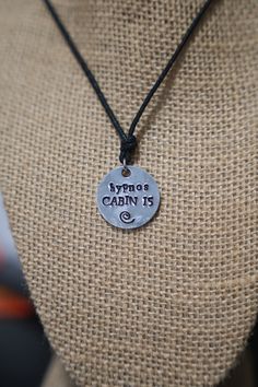 a necklace that says,'my moms cabin is '