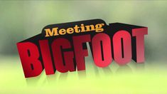 a red and black sign that says meeting bigfoot on it's side in front of a blurry background