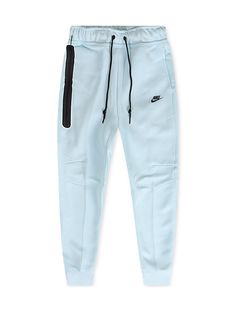 Upgrade your casual look with Nike Sportswear Tech Fleece Joggers. These joggers feature a slim, tailored fit with smooth, warm fleece and ribbed cuffs. The iconic paneled design, articulated knees, and taped pocket with an organizer offer both style and functionality. Made from a cotton-poly blend for comfort, they pair perfectly with the Tech Fleece hoodie. Light Blue Nike Joggers, Blue Nike Tech Fleece, Jean Hat, All Jordans, Tech Fleece Hoodie, Nike Sportswear Tech Fleece, Nike Tech Fleece, Nike Tech, Fit Ideas