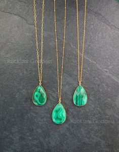 Malachite gemstone with rich green color on a custom length 14k Gold Filled chain. Customize your necklace in your choice of cable, link or satellite chain.  The back of the pendant is like the front but with a different natural pattern and design.  Malachite clears and activates all Chakras, and is especially helpful in the stimulation of the Heart and Throat Chakras. An extremely powerful metaphysical stone, Malachite is often called the "stone of transformation" and is used for deep energy cleaning, bringing healing and positive transformation to the wearer. Your necklace will arrive in a beautiful gift box and gift bag.  Stone: Malachite Shape: Teardrop, Multifaceted finish   Size:  7/8" inch wide, 1 3/8" inch height       Chain: 14k Gold Filled Length: custom length Clasp: secure lobs Malachite Crystal, Necklace Outfit, Malachite Necklace, Malachite Pendant, Malachite Jewelry, Les Chakras, Rich Green, Patterns In Nature, Beautiful Gift Boxes