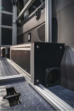 the back end of a truck with its door open