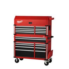 the milwaukee tool cabinet is red and has two drawers on each side, with one drawer open