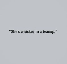 a black and white photo with the words she's whiskey in a teacup