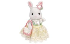 a white stuffed rabbit holding a purse and wearing a dress with lace on it's skirt