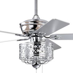 a ceiling fan with crystal chandelier hanging from it's blades and light fixture