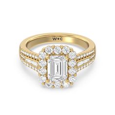 a yellow gold engagement ring with an emerald center surrounded by round brilliant cut diamond shoulders