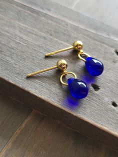 Boldly beautiful and colorful blue cobalt stone and gold earrings. Soft blue stone earrings with vibrant 18k gold metal posts. One of a kind handmade jewelry piece that makes the perfect gift for a friend or loved one! Be sure to check out the BLUE EARRINGS section at EarringsbyLCreations for all beautiful blue colored earrings available! https://www.etsy.com/shop/EarringsByLCreations?section_id=28404960 Made with quality materials and always nickel and lead free metals. Naturally colorful jewelry made by hand to complement your beauty.  Perfect gift for a friend or loved one: All jewelry pieces are packaged in jewelry boxes, wrapped in burlap ribbons and gold twine thread. Rustic wrapping for gift ready giving. Personalized gift messages available. See Gift Wrapping at checkout) STAY CONN Blue Gemstone Teardrop Earrings For Gift, Blue Teardrop Gemstone Earrings, Blue 14k Gold Drop Earrings, Handmade Blue 14k Gold Filled Earrings, Blue Gemstone Teardrop Earrings, Blue Gemstone Gold Plated Earrings, Vibrant Blue Drop Earrings, Royal Blue Earrings, Handmade Blue 14k Gold-filled Earrings