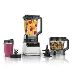 Enjoy more than just blending with the Ninja Grand Kitchen System 1200. Equipped with a 72-oz. full-size pitcher, 8-cup food processor bowl, and (1) 18-oz. single-serve cup, you have enough capacity for the whole family. With four preset and three manual programs, you can use this device as a blender, food processor, and dough mixer. Create everything from smoothies for one to frozen drinks for a crowd, and prep anything from salsas to doughs. Color: White. Bar Kitchen Ideas, Food Room, Compact Microwave, Coffee Bar Kitchen, Blender Food, Dough Mixer, Grand Kitchen, Ninja Blender, Cup Food