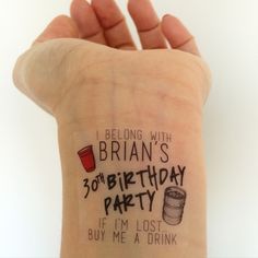 a person with a tattoo on their arm saying,'belong me a drink britain's 30th birthday party if i'm lost buy me a drink