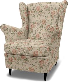 an upholstered chair with floral fabric