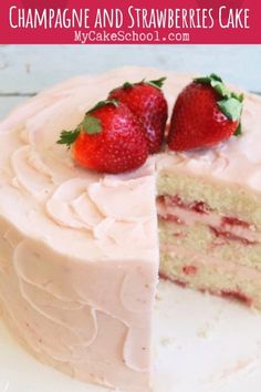 a strawberry cake with two slices taken out of it