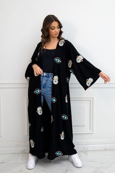 Featuring: Abaya Kimono Evil Eye & Hamsa Hand Embroidery Maxi Length Color: Black.Brand: Unmatched BYU Length: 55... Traditional Black Festive Kimono, Black Bohemian Style Festive Kimono, Black Kimono With Floral Embroidery, Festive Embroidered Kimono With Kimono Sleeves, Black Floral Embroidered Kimono, Black Embroidered Long Sleeve Kimono, Festive Black Bohemian Kimono, Festive Bohemian Black Kimono, Festive Black Long Sleeve Kimono